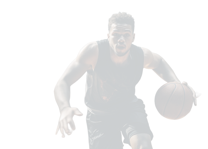 Close-up of a basketball player dribbling on the court